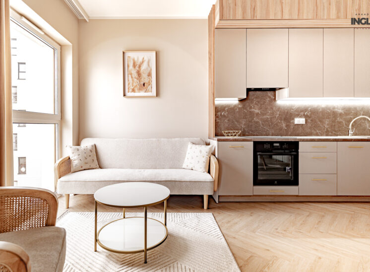 Jasna sofa i kuchnia w mieszkaniu w stylu boho.